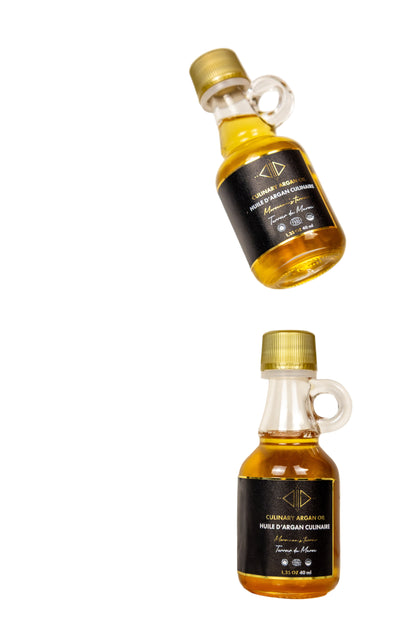 Two bottles of Cynar on a light background